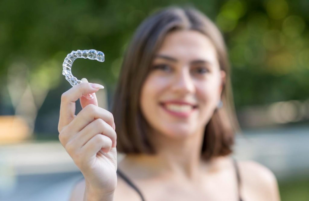 how to straighten your teeth with invisalign