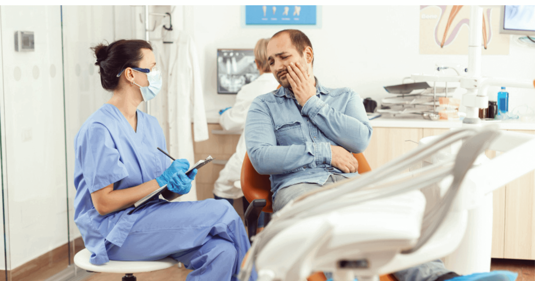Person holding jaw in pain, representing a toothache emergency