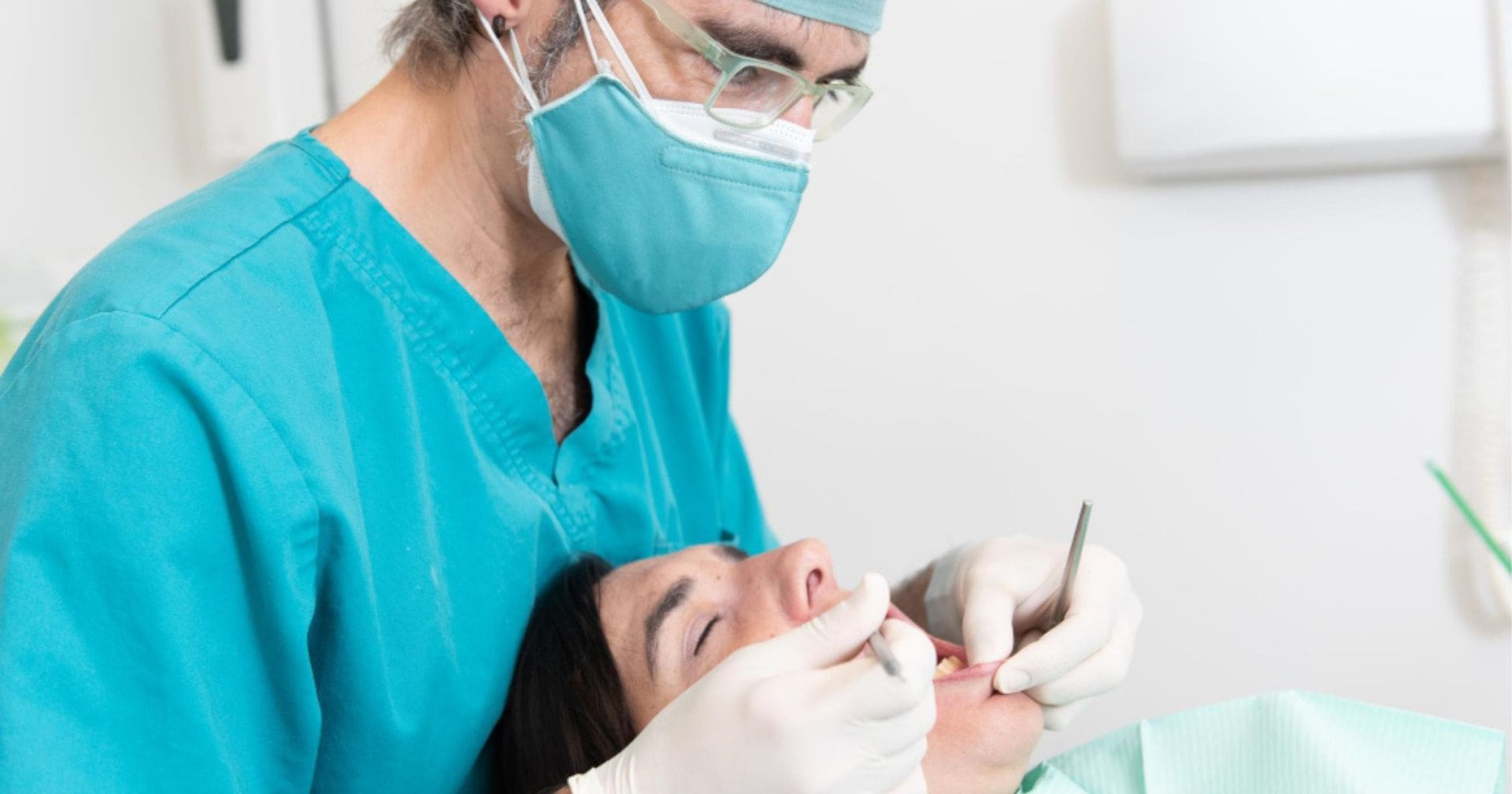 dentist examining a patients gums during a checkup in Wodonga